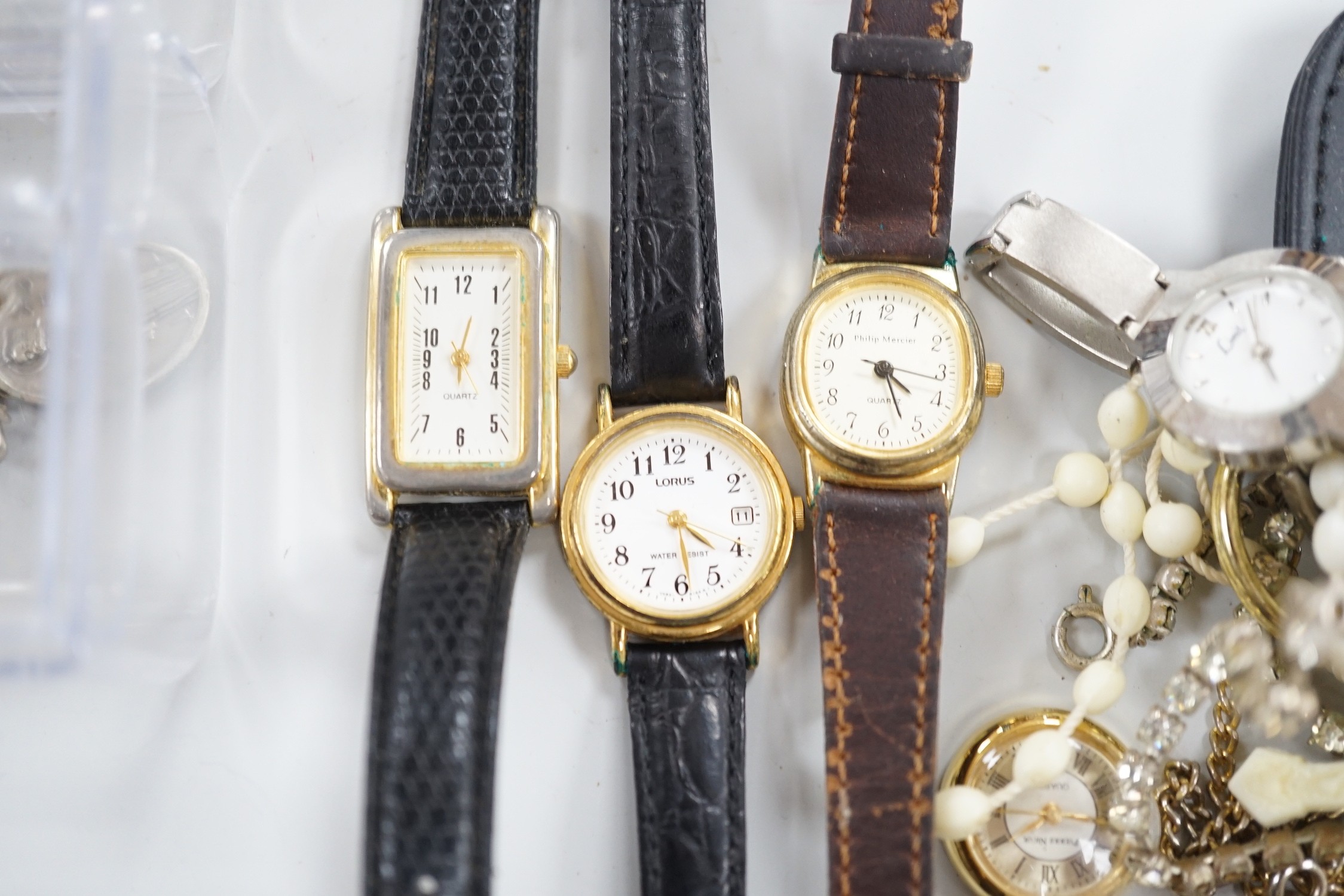 A small quantity of assorted costume jewellery and wrist watches.